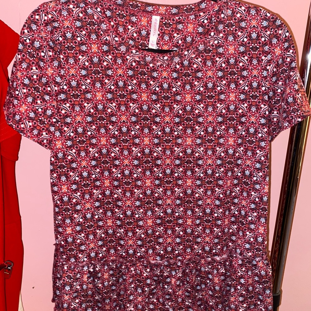 Soft Patterned Shirt with small peplum on bottom!